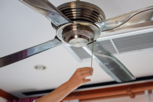 Change the direction of ceiling fan to help with air flow