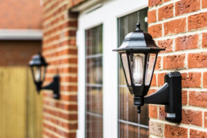 Image of two exterior light fixtures on the front of a home